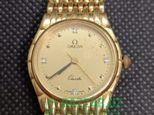 Золотые часы Omega с 4 бриллиантами
